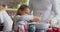 Father and daughter preparing cookie on worktop in kitchen at home 4k