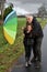 Father and daughter in stormy weather