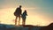 Father and daughter teamwork happy family tourists silhouette concept navigation . team dad and daughter on top of a