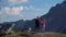 Father and daughter are traveling in the mountains