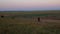 Father and daughter walking by lakes on evening nature lansdcape. A little girl hiking with dad outdoor. Tourist child leading her