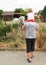 Father and daughter watching horse