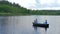 The father fishing with family on the river