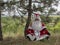 Father Frost meditates outdoors.