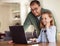 Father, girl and laptop for remote education in home, internet and school website or online homework. Daddy, daughter