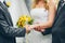 Father gives his daughter\'s hand to the groom at a wedding cerem