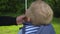 Father gives his son an umbrella