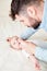 Father gives newborn baby nasal spray