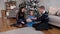 Father Giving Christmas Presents to his Family