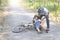 Father helped the daughter fall bike