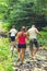 Father and his daughters exploring the nature