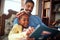 Father and his girl  reading Christmas fairy tales