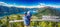 Father and his son enjoying the view to Locarno city and Lago Maggiore from Cardada mountain, Swiss Alps, Ticino, Switzerland