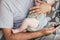 Father holding newborn baby. Newborn baby sleeping on farther hands. Care, birth, lifestyle concept