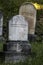 Father and Husband Grave Markers at an Old Cemetery