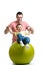 Father and kid son having fun with gymnastic ball