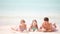 Father and kids enjoying beach summer tropical vacation