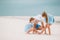 Father and kids enjoying beach summer vacation