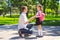 Father leads daughter to school in first grade. first day at school. back to school