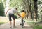 Father learn his little son to ride a bicycle