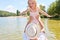 Father lifts daughter up on a boat trip