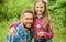 Father little girl enjoy summertime. Dad and daughter blowing dandelion seeds. Keep allergies from ruining your life