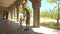 Father Little Girl Squat in Gallery Shade of Gothic Building