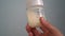 Father Making Baby Formula In Milk Bottle