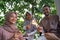 father, mother and daughter lit fireworks together to celebrate