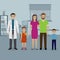 Father and mother with two kids visit doctor`s office. Family healthcare concept.