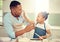 Father, playing and girl baking in family kitchen with flour, food and dough while learning to bake cake. Happy dad