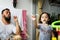 Father playing soap bubbles with child at home. Stay home during lockdown due to Coronavirus,