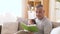 Father reading book for little baby boy at home