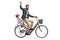 Father riding a child in a bicycle child`s seat and waving at the camera