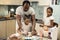 Father rolling out pastry for pie with his helpful daughter