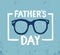 Father`s day inscription written with elegant calligraphic font on blue background and decorated with glasses and frame