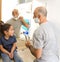 Father shaving and doughter watching