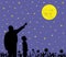 Father is showing full moon to his amazed kid with wow face