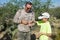 Father shows the child a rare lizard - Gila monster