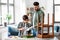 father and son applying solvent to tissue at home