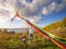 Father with son in autumn playing with kite