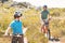 Father and son biking through mountains