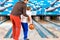 Father and son in bowling center