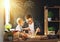 Father and son carved of wood in carpentry workshop