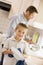 Father And Son Cleaning Dishes