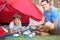 Father And Son Cooking Breakfast On Camping Holiday