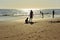 Father and son on the Costa Ballena beach, Cadiz province, Spain