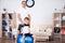 Father and son are engaged in fitness together with fitball.