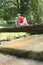 Father and son fishing from bridge