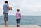 Father and son fishing together